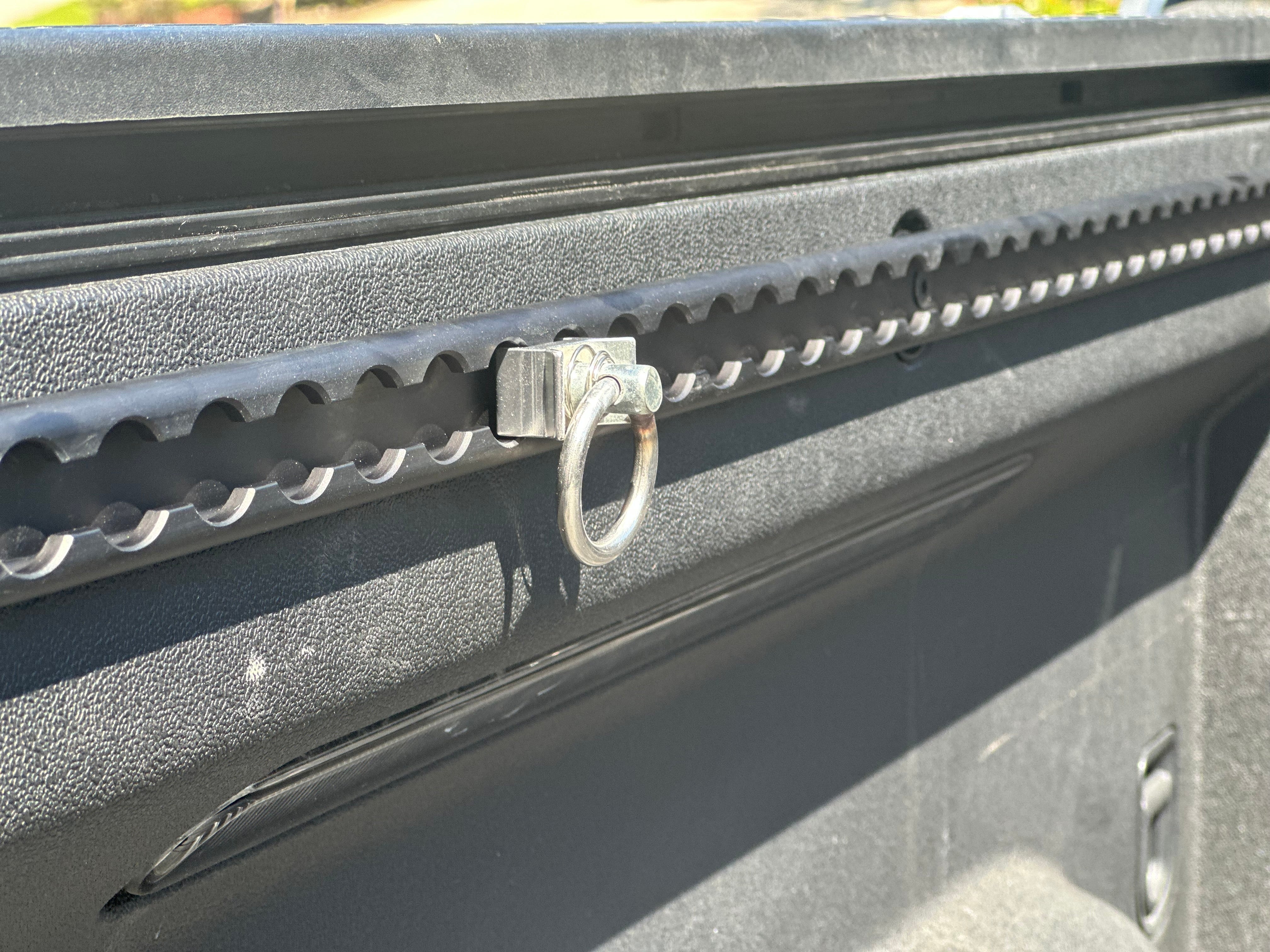 R1T bed L-Track system